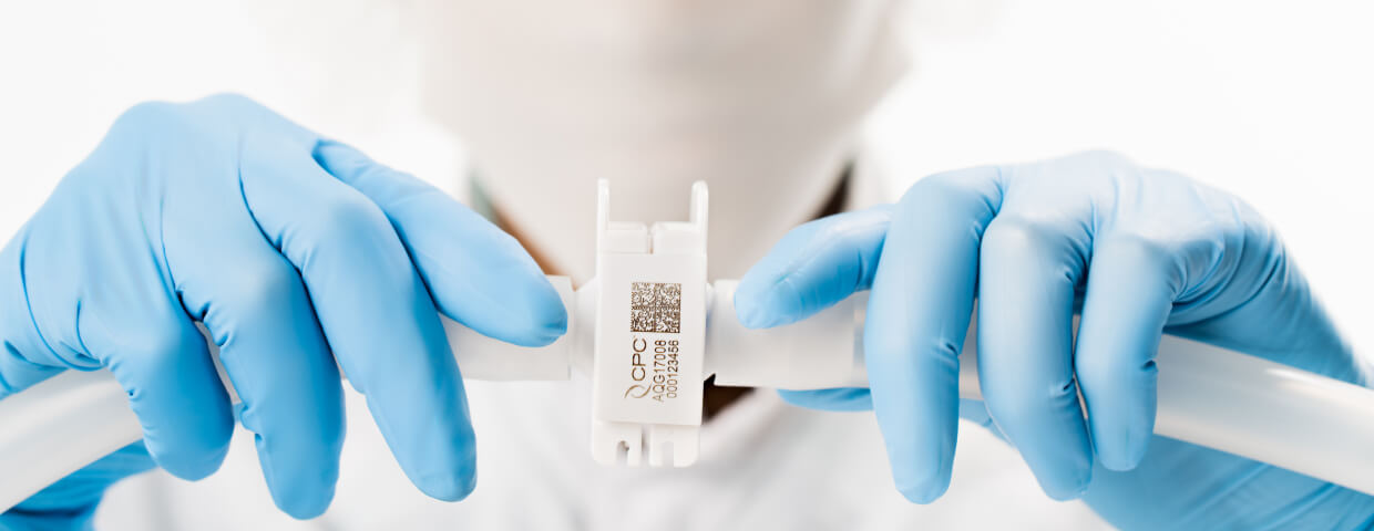 Scientist holding connector