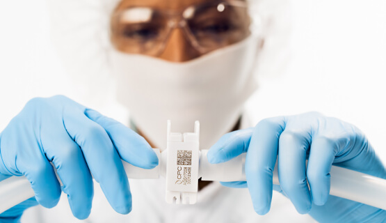Scientist holding connector