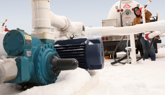Pumps & Process Solutions Man working pump in arctic conditions