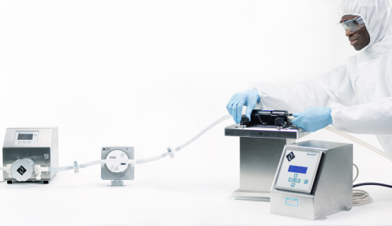 Man operating biotech pumps